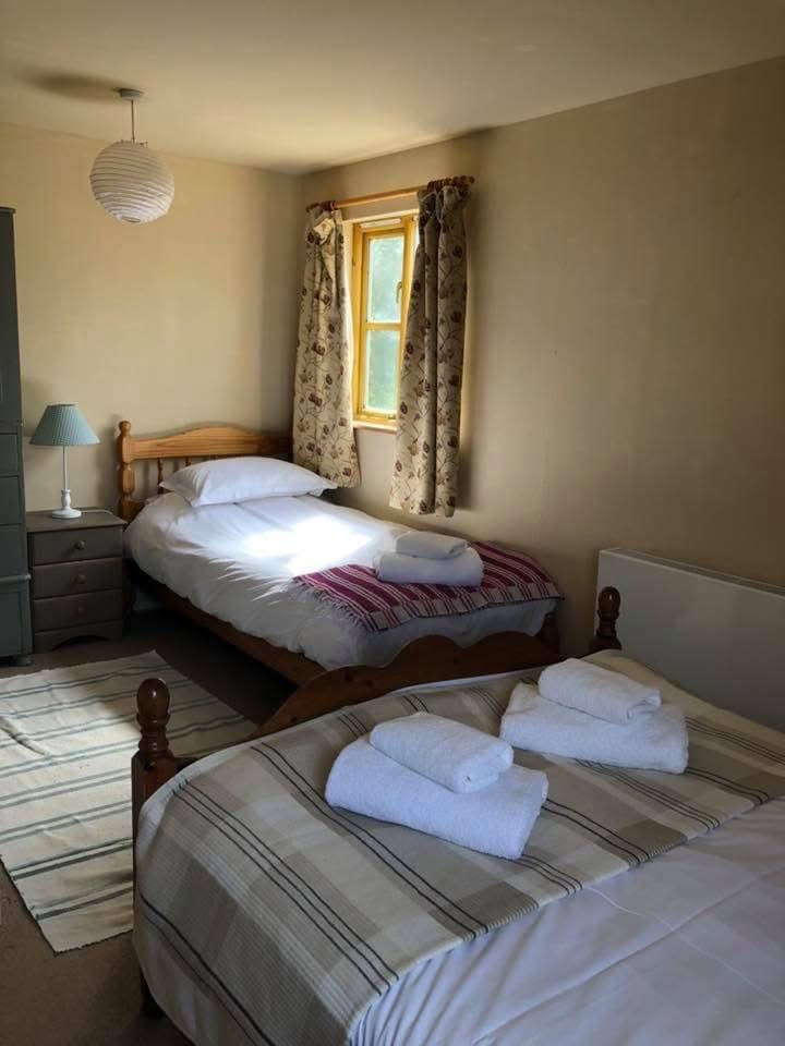 A comfortable twin bedroom at the venue
